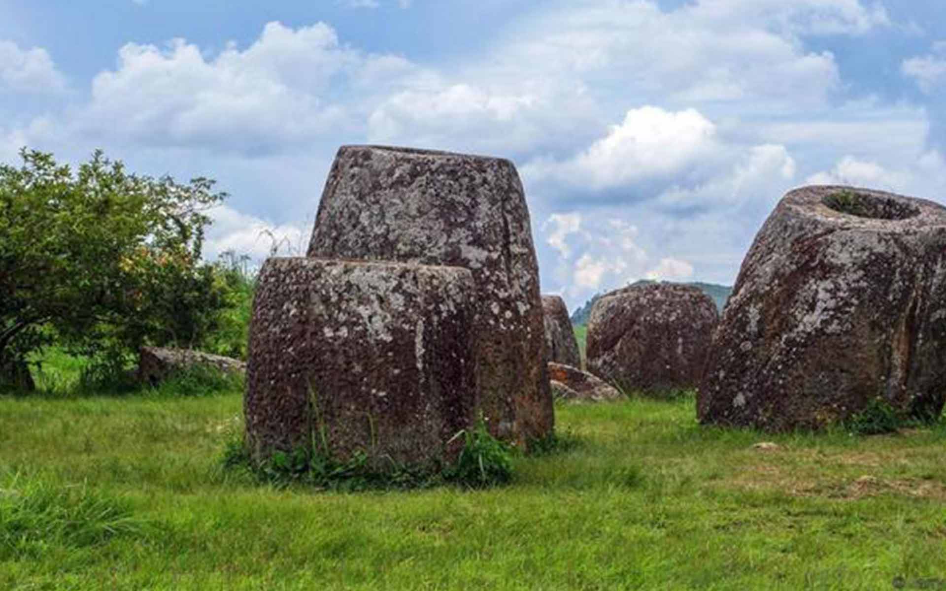 huge ancient stone jars in laos