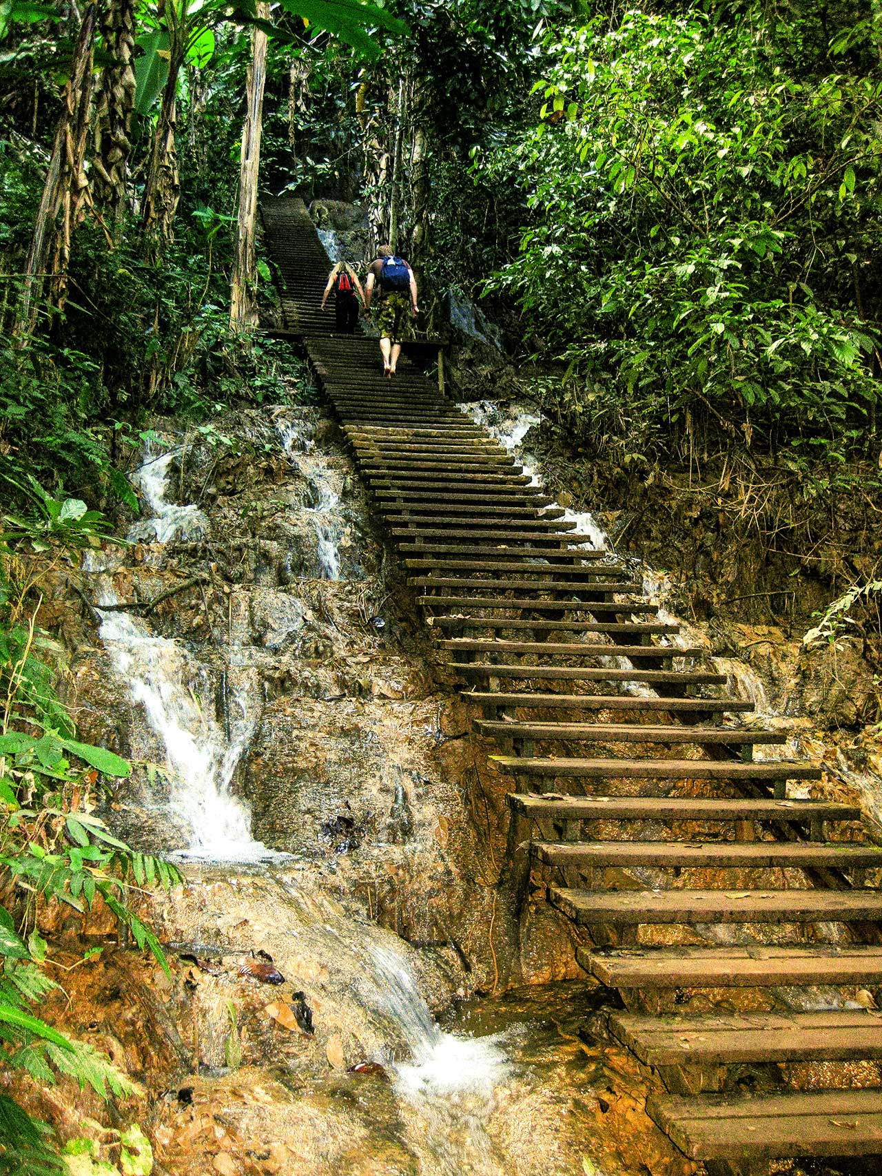 hiking to the top of Kuang Si Waterfall